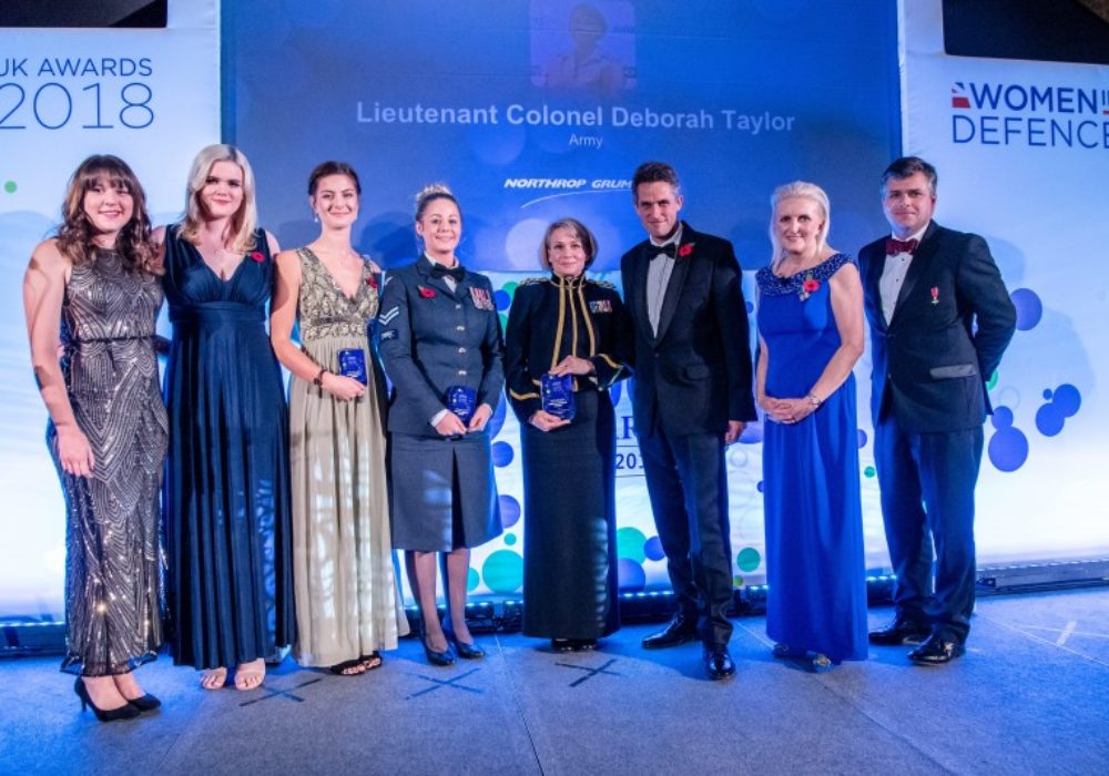 Lt Col Deborah Taylor (Middle) receiving her Women in Defence award